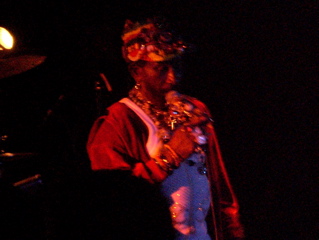 Lee Scratch Perry with a Pearly Kings and Queens look
